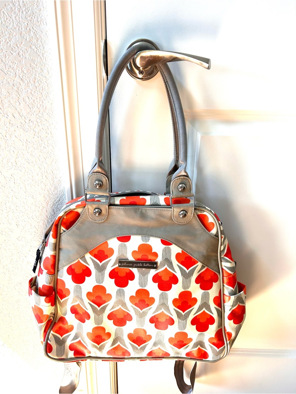 Petunia Pickle Bottom Glazed Sashay Satchel Backpack in Brittany Blooms Print.